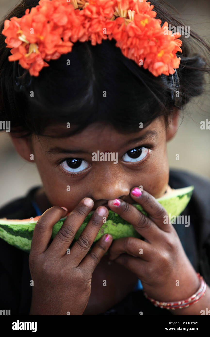Indian girl eating a slice watermelon Andhra Pradesh South India Stock ...