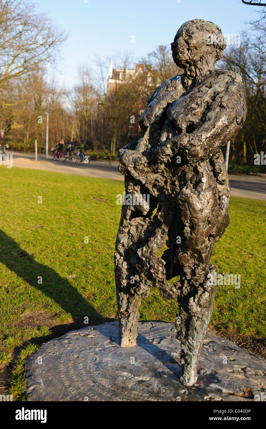 Bronze statue by Nelson Carrilho of Kerwin Duinmeyer, a 15 year old boy murdered in a racist attack in Amsterdam in 1983 Stock Photo