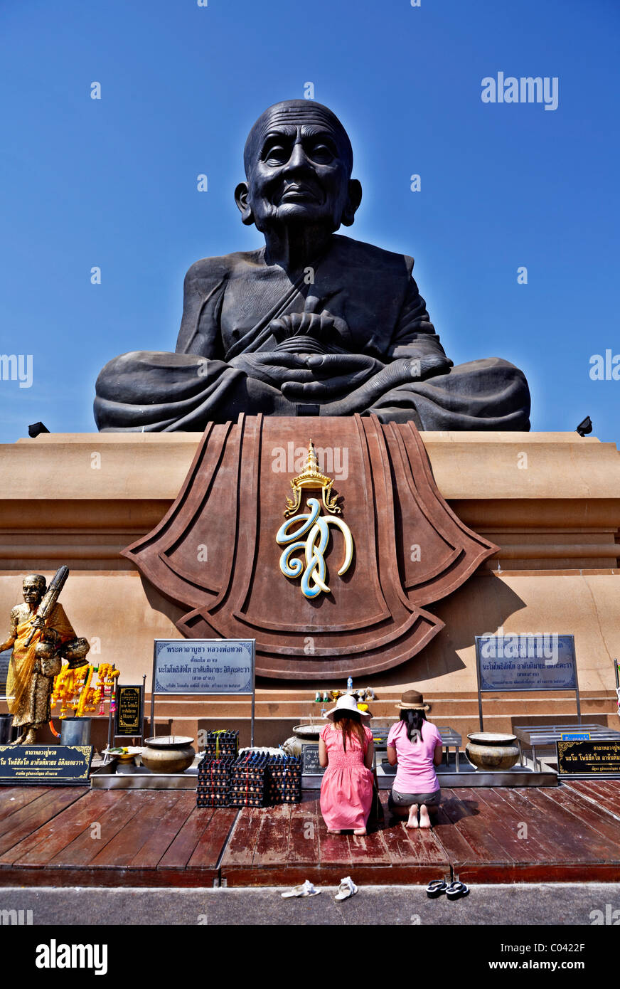 The giant statue of revered monk Luang Pu Thuat at Wat Huay Mongkol Hua Hin Thailand Asia measuring some 31.5 feet in height. Stock Photo
