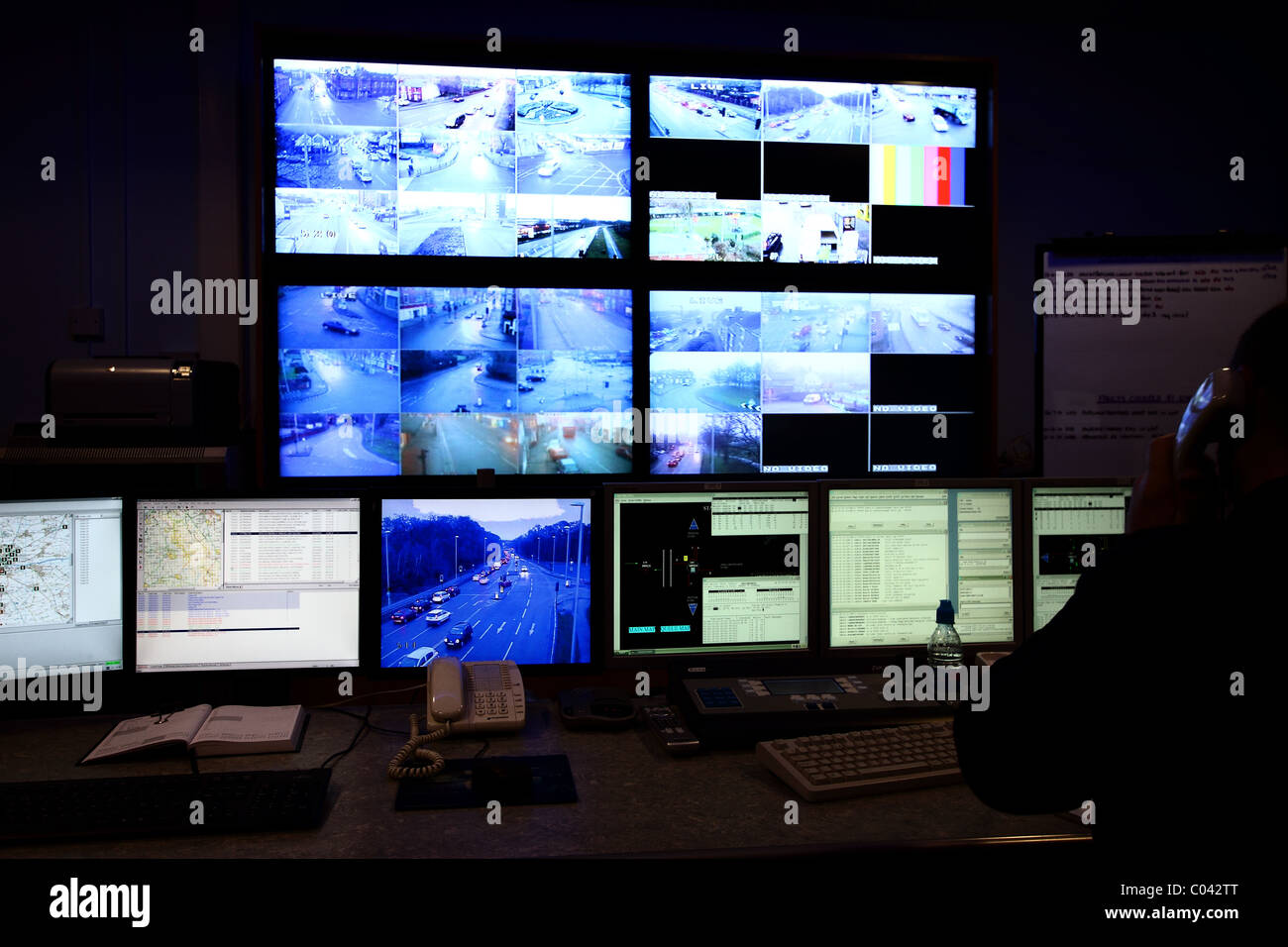 CCTV, traffic, enforcement, scheme, current legal framework, control room,  city traffic, TV monitors, operators, 24/7, monitoring, surveillance, TV. Stock Photo