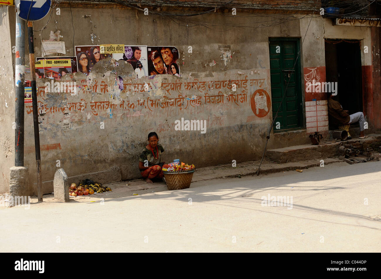 old lady selling fruit on street corner ,peoples lives ( the nepalis ) , life in kathmandu , kathmandu street life , nepal Stock Photo