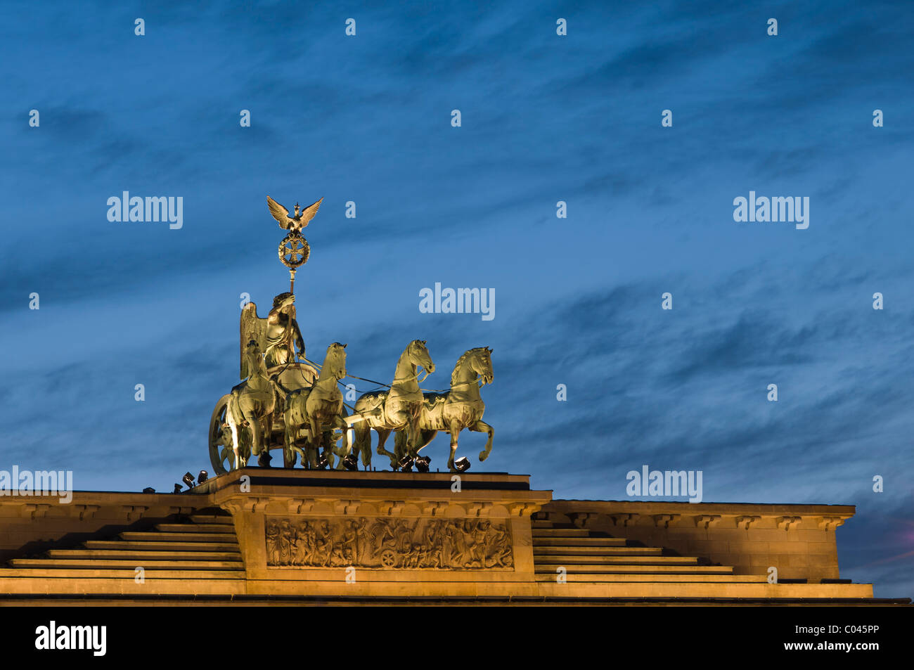 The Quadriga victory statue crowns the Brandenberg gate, Berlin Stock Photo