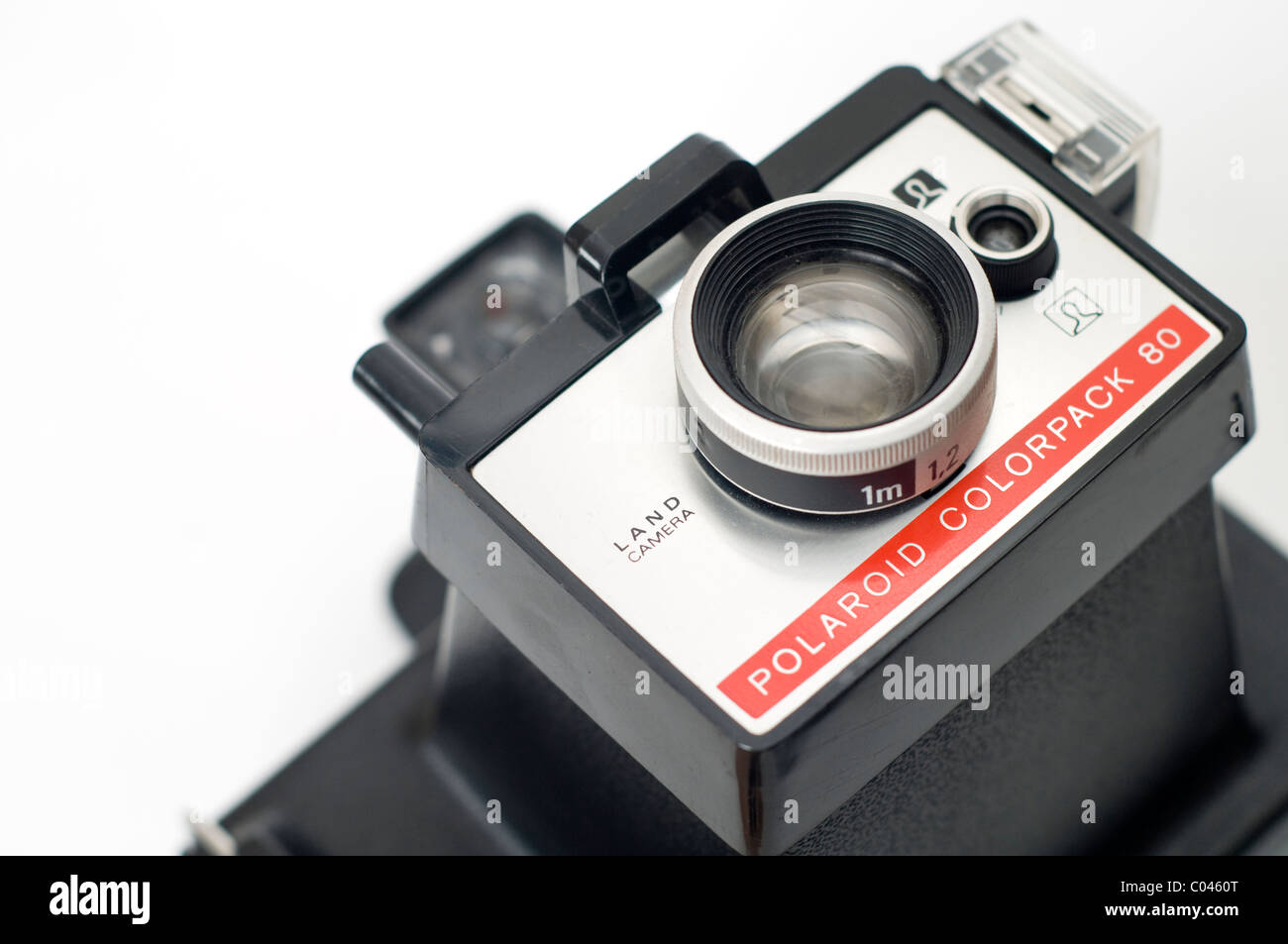 Detail of an old Polaroid film camera on a white background Stock Photo