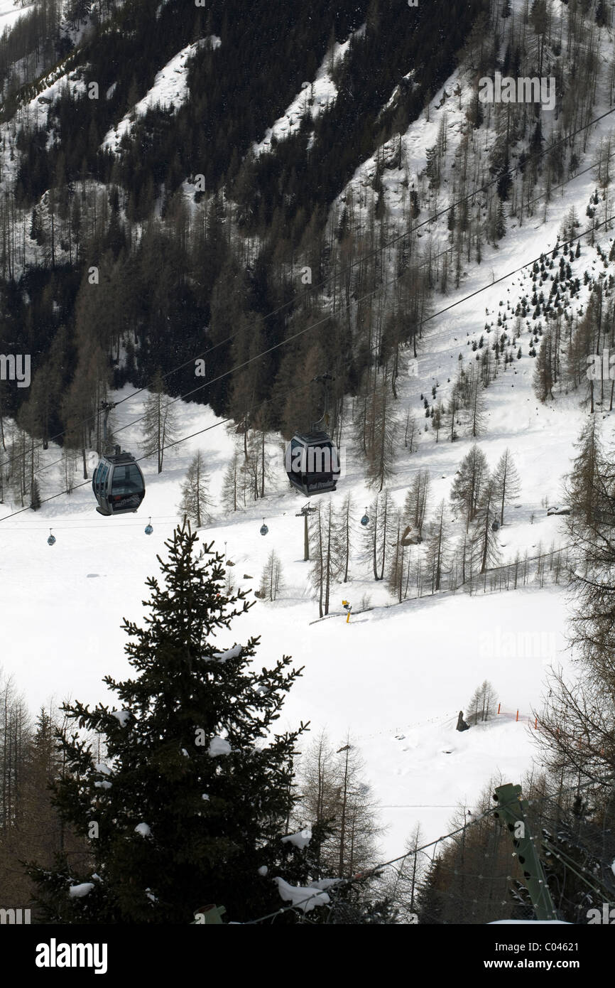 Cable Car traversing the valley at Colfosco in the valley between Selva and Corvara Dolomites winter Italy Stock Photo