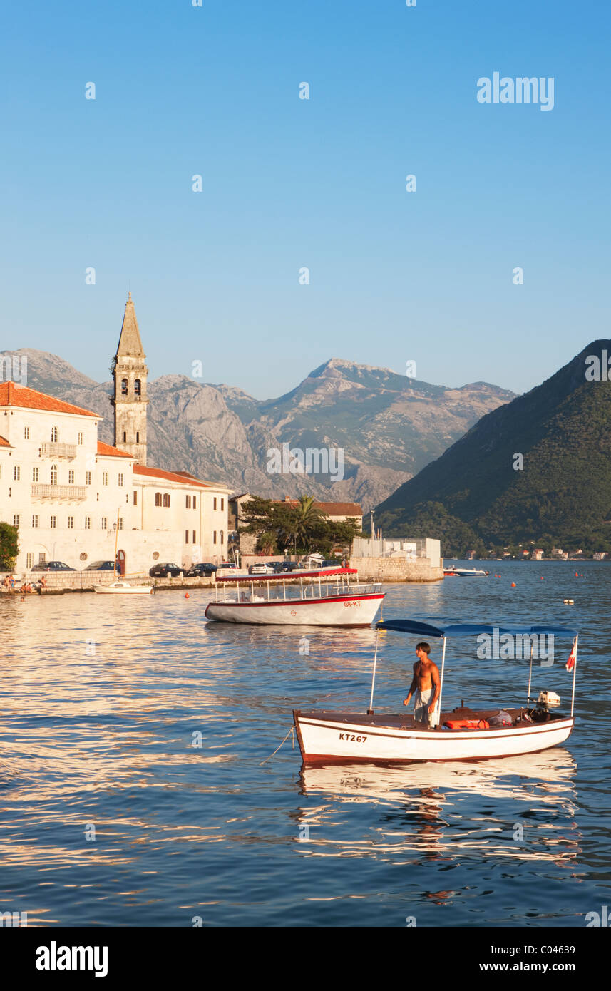 Man in boat, Perast, Boka Kotorska, Montenegro Stock Photo