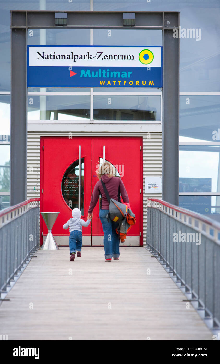 Woman and girl walking up to the entrance of the Multimar Wattforum Museum in Toenning, Schleswig Holstein, Germany Stock Photo