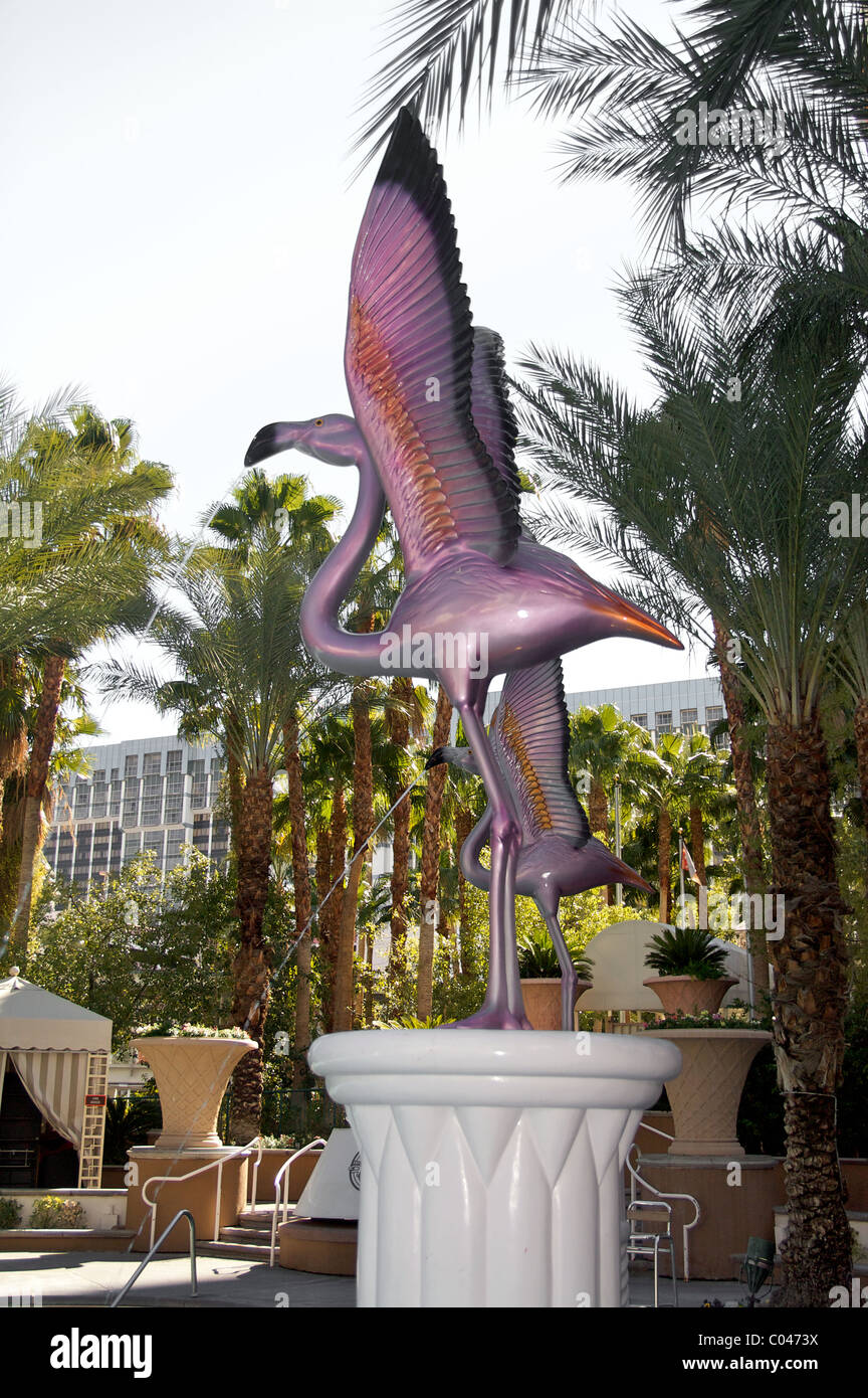 Flamingo figures spouting water into a pool at the Flamingo Las Vegas Hotel and Casino Stock Photo