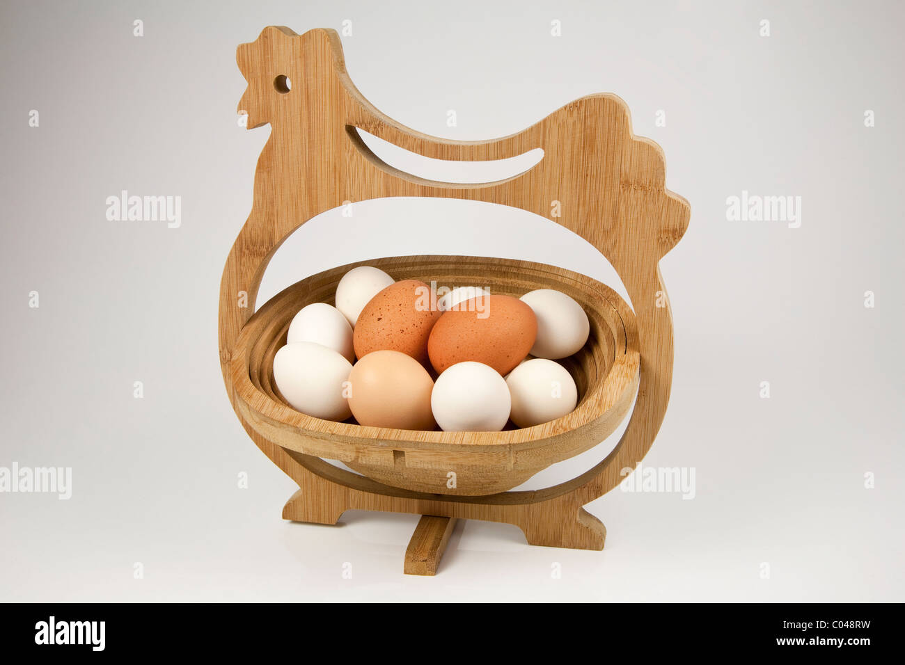 Free Range Eggs in Wooden Hen Basket Stock Photo