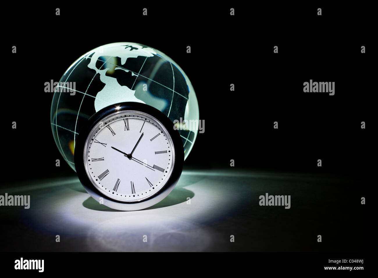 Globe and clock for background Stock Photo Alamy