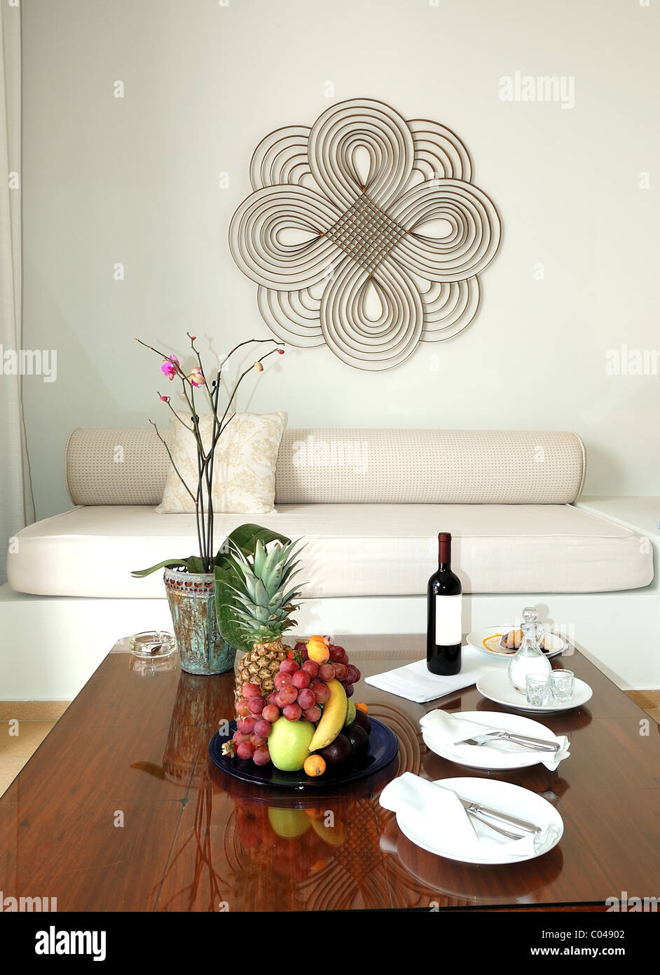 Interior of the luxury villa served with wine, Greek vodka and fruits ...
