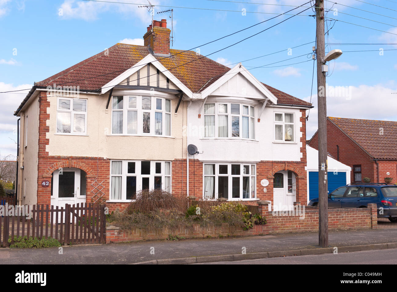 A pair of bay fronted semi detatched houses in Southwold , Suffolk , England , Britain , Uk Stock Photo
