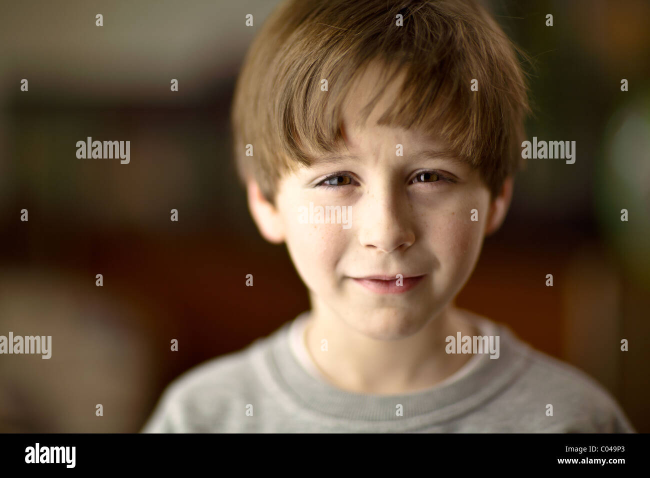 Small boy with anxious look on his face. Stock Photo