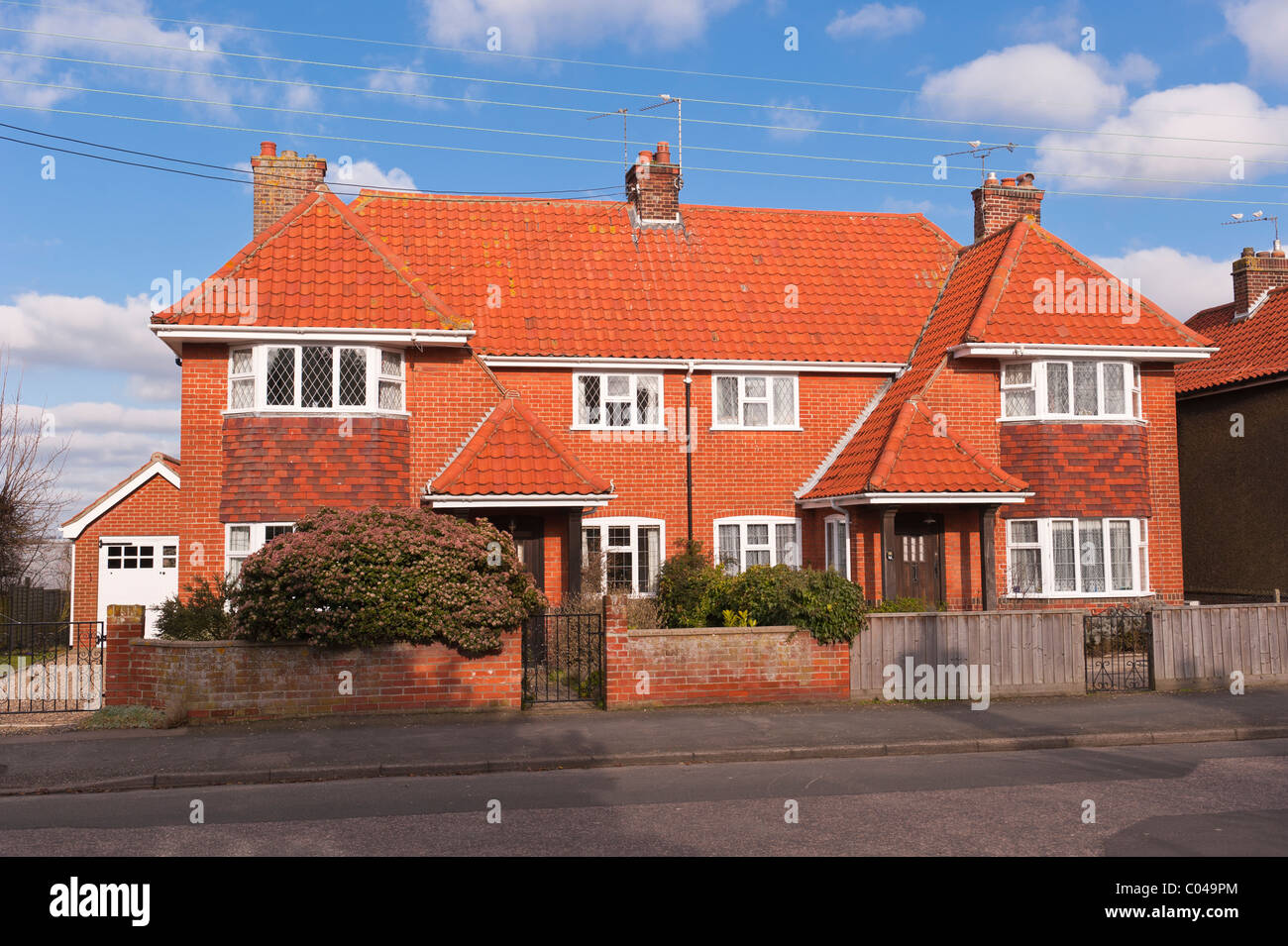 A pair of bay fronted semi detatched houses in Southwold , Suffolk , England , Britain , Uk Stock Photo