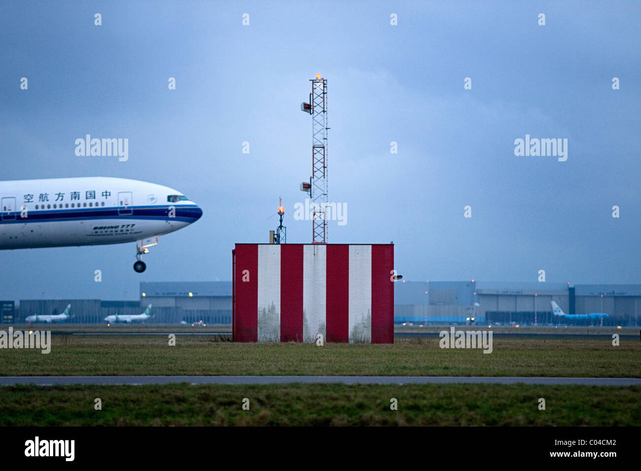 Airplane Landing At Schiphol Airport Amsterdam Stock Photo Alamy