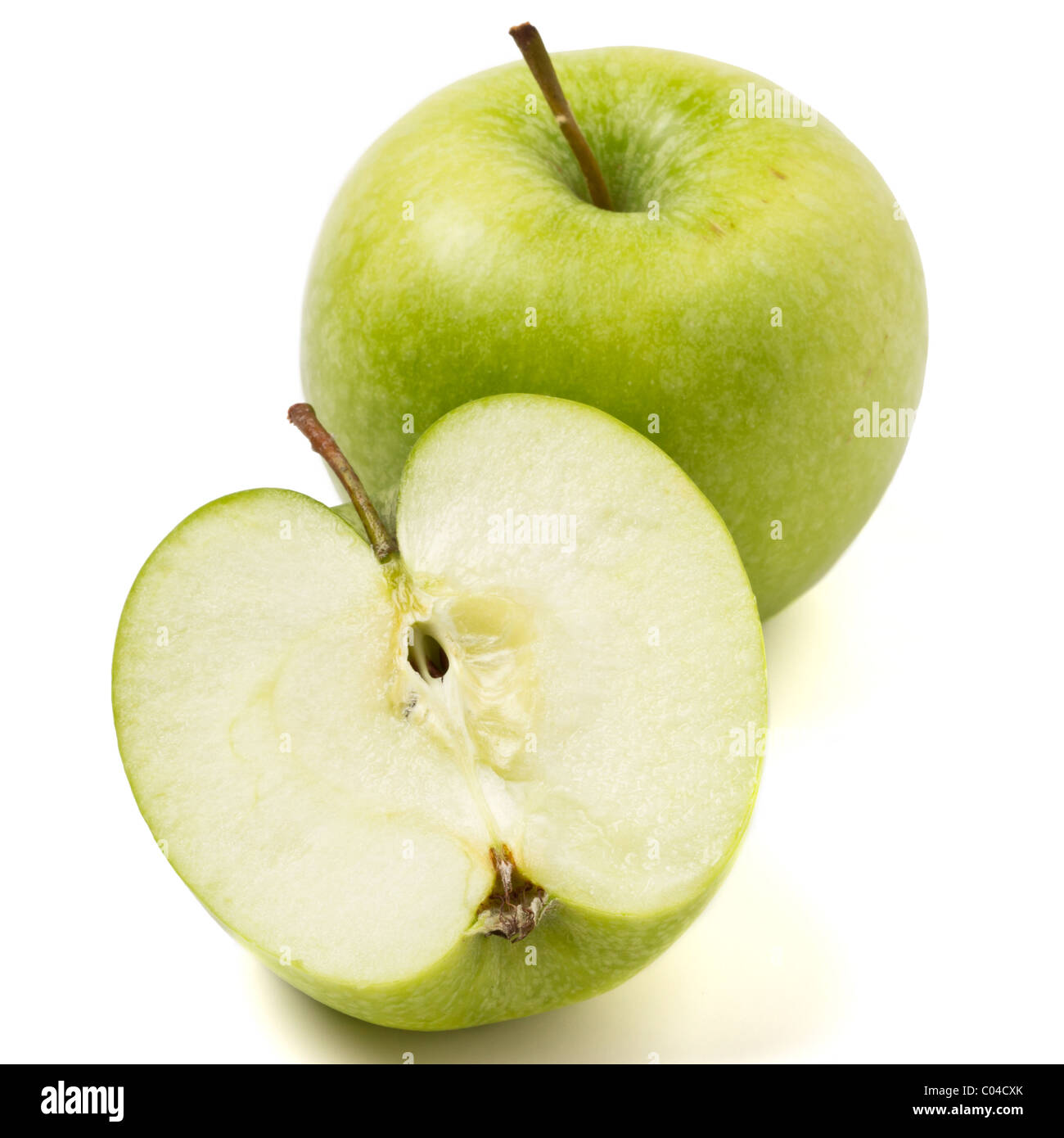 Granny Smith variety of apple from low perspective isolated on white. Stock Photo