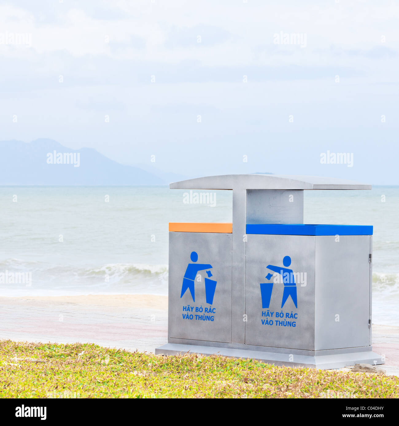 Two recycling bin on the beach. Environmental protection Stock Photo