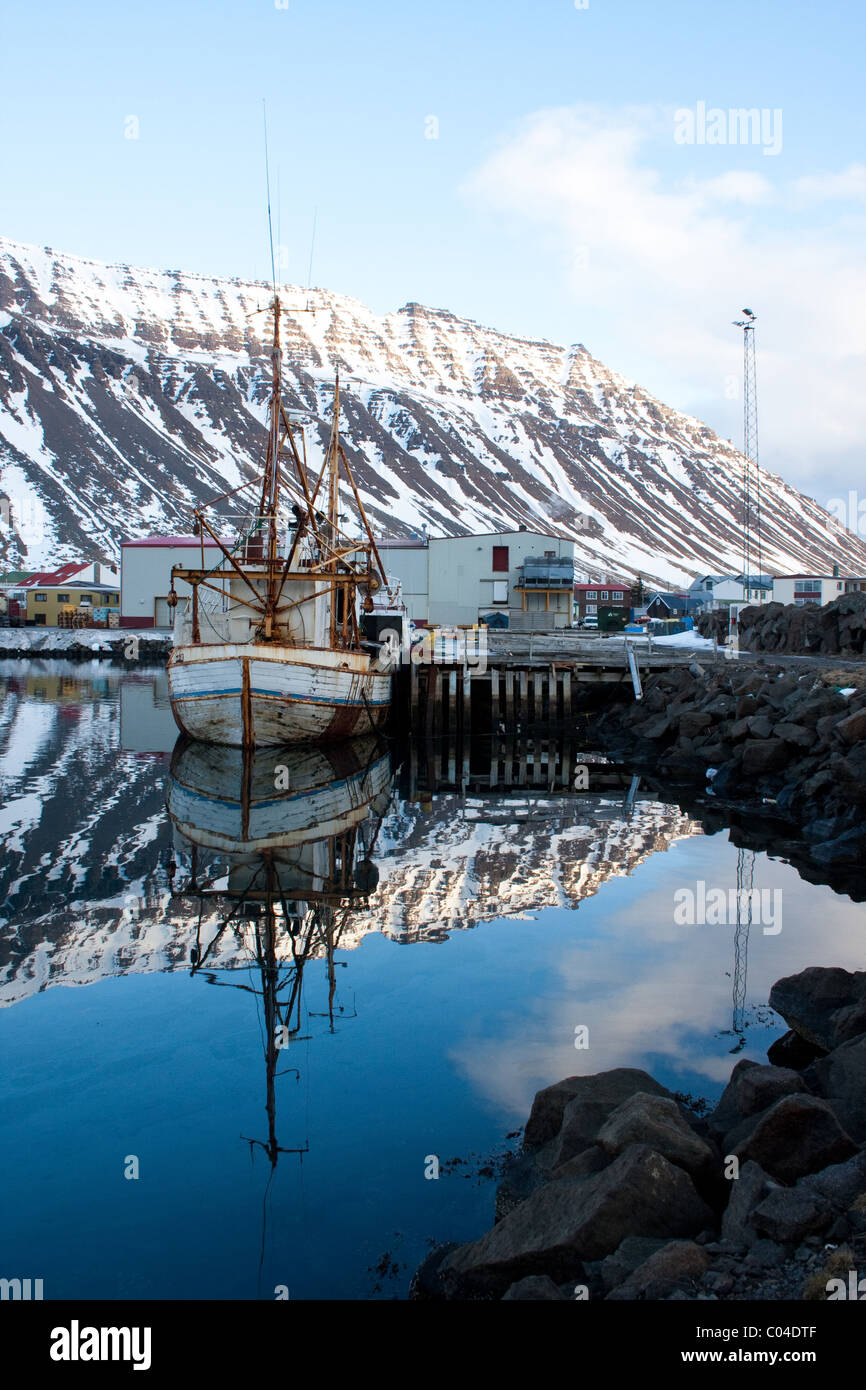 A rusty old boat in the harbour of Isafjordur, Iceland. Stock Photo