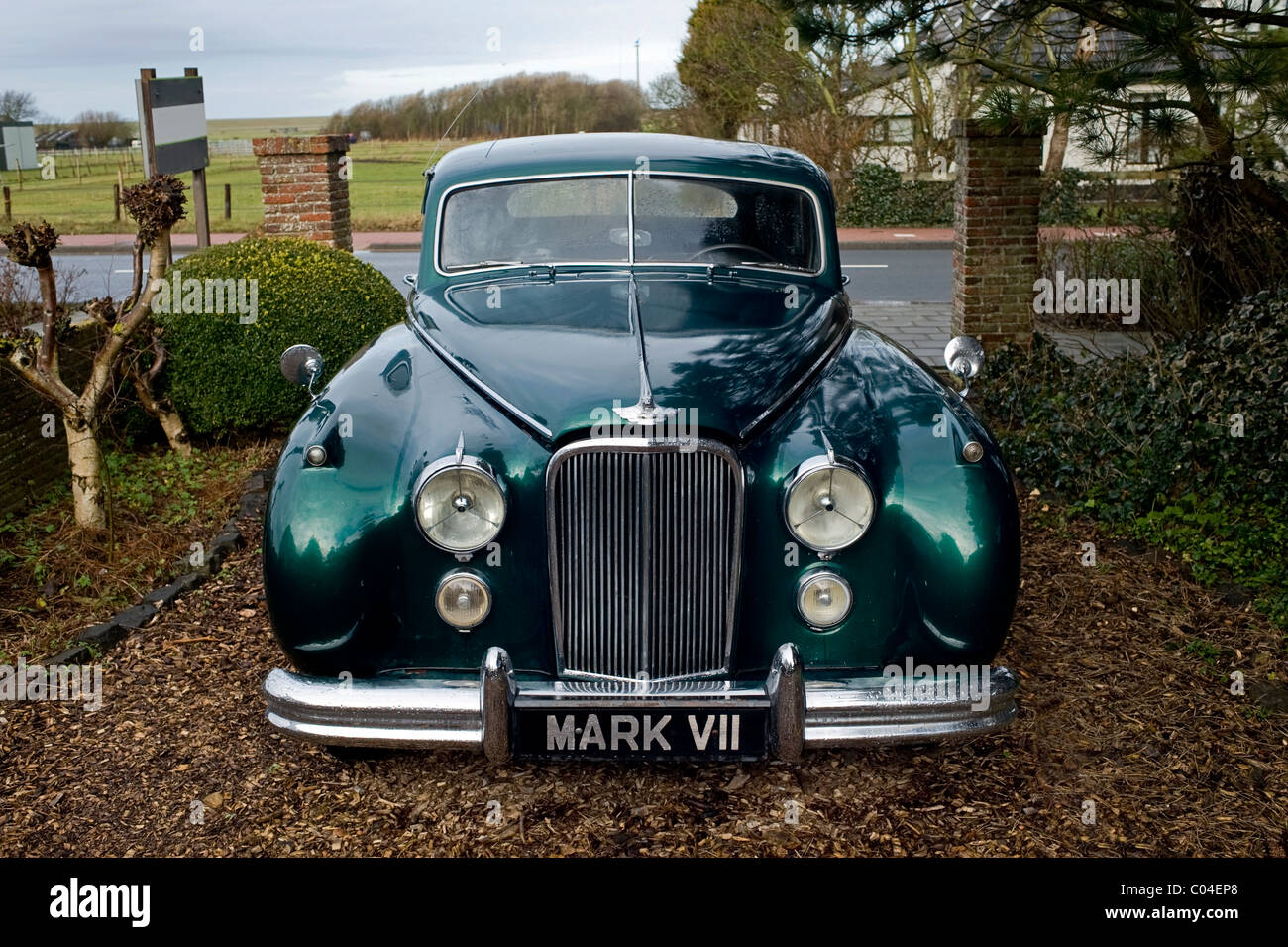 vintage Jaguar MarkVII parked in a driveway in Wijk aan Zee, Holland Stock Photo