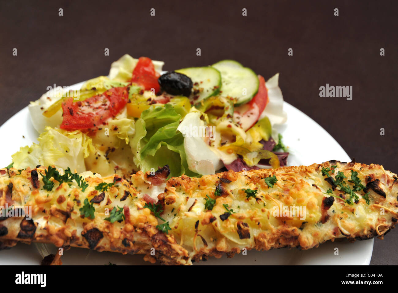 Cheese and ham baguette with salad Stock Photo
