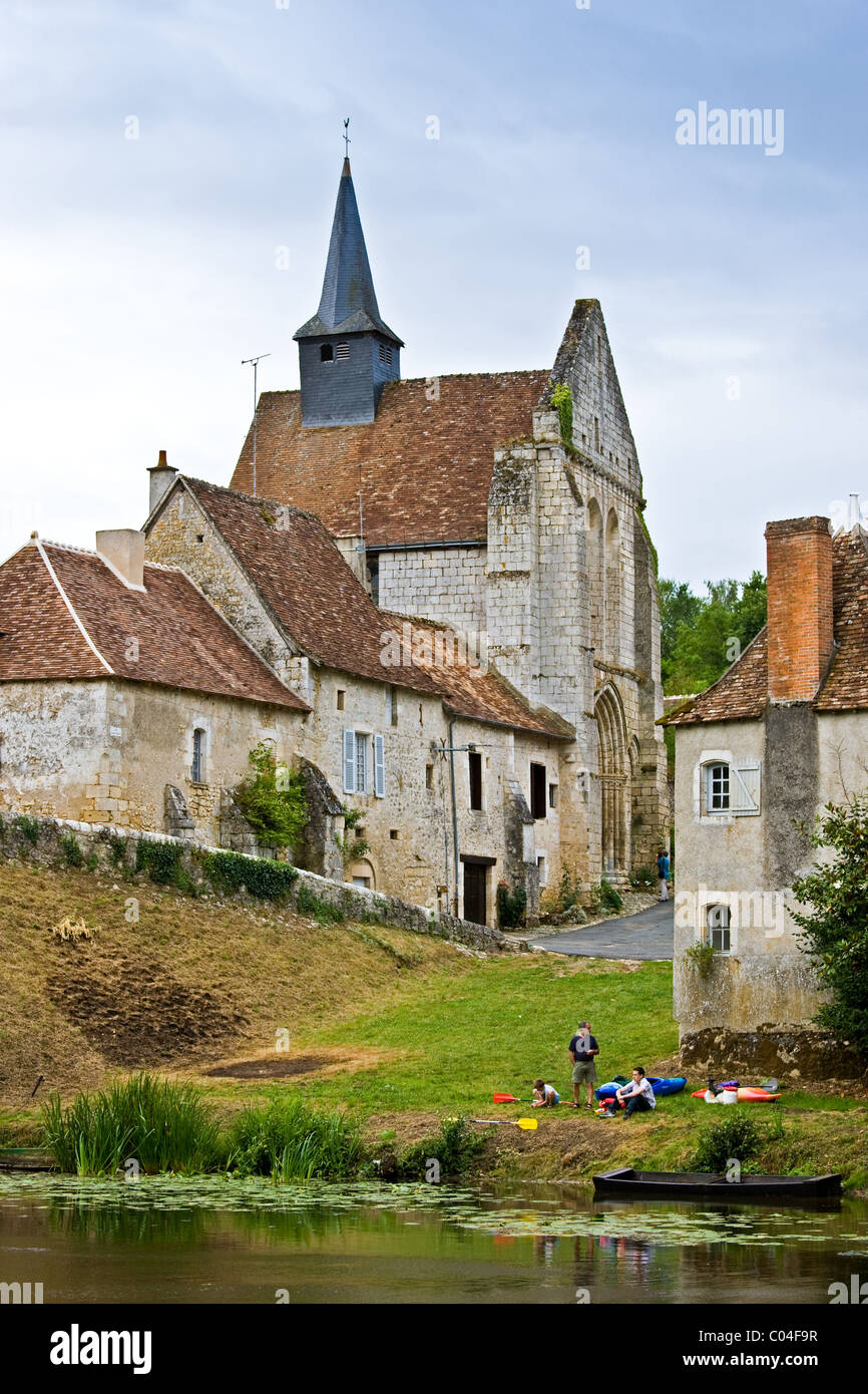 People with kayaks in traditional medieval village of Angles Sur L'Anglin, Vienne, near Poitiers, France Stock Photo
