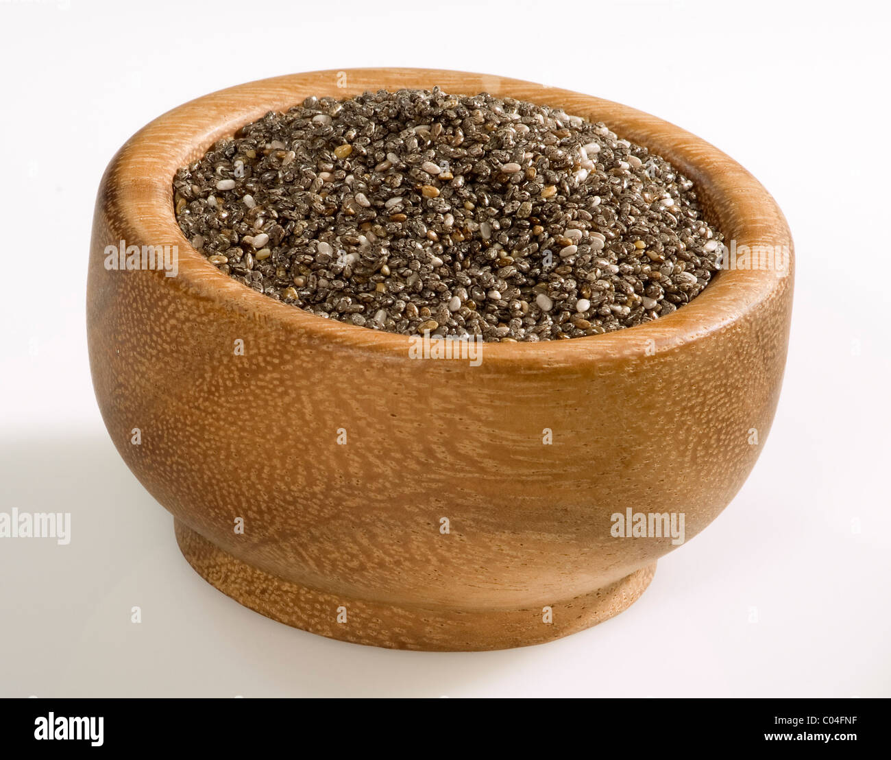 Chia seeds in a wooden bowl. Stock Photo