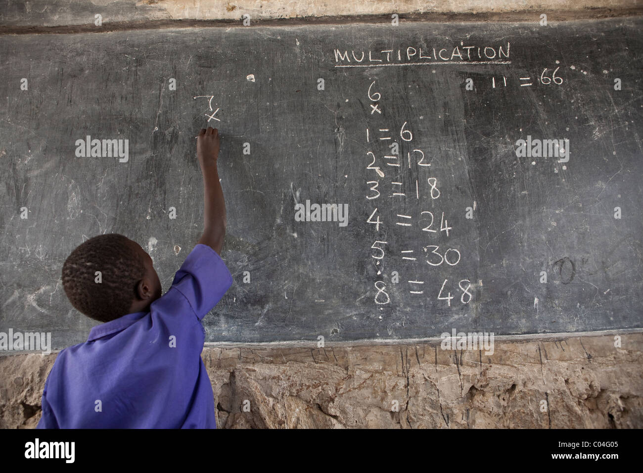 A student learns mathmatics at Abia Primary School - Amuria District, Uganda, East Africa. Stock Photo