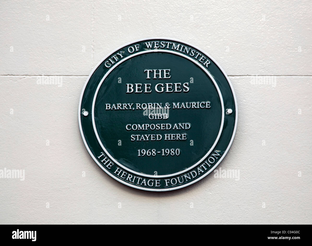Plaque on house in Mayfair, London used by the Bee Gees in the Sixties. Stock Photo
