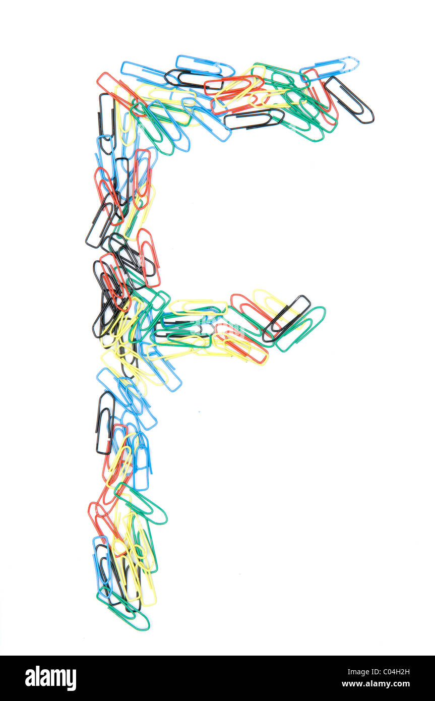 Letter F formed with colorful paperclips Stock Photo