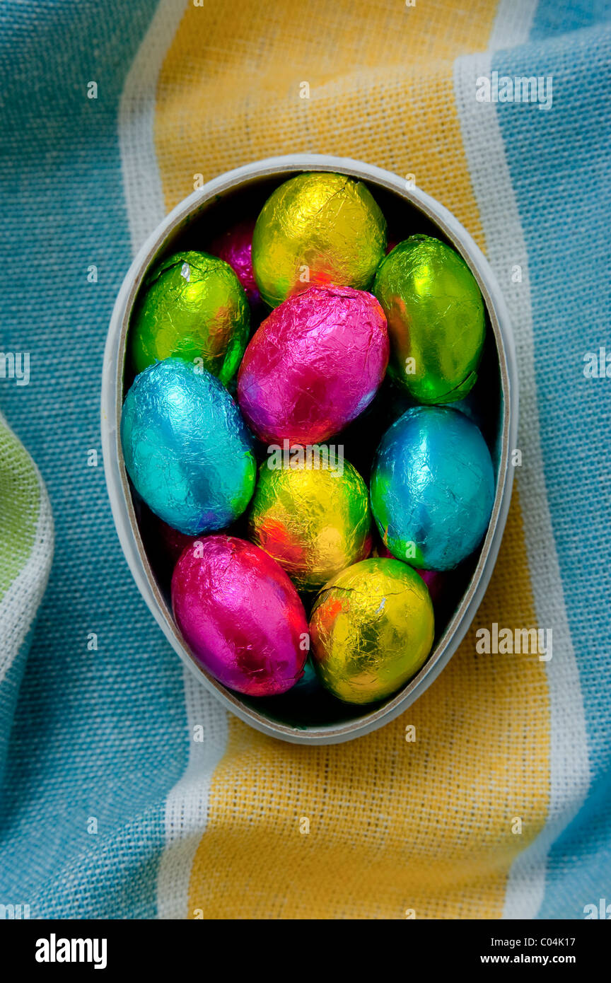 Mini Chocolate Easter Eggs In Cardboard Egg Box On Textured