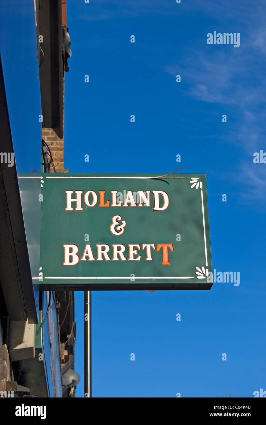 sign for a holland and barrett shop at a branch of the british health food chain in new malden, surrey, england Stock Photo