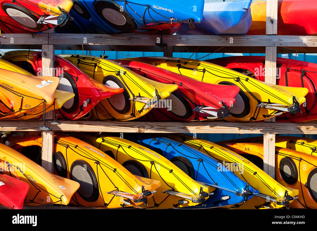 Rows of colorful kayak rentals. Stock Photo