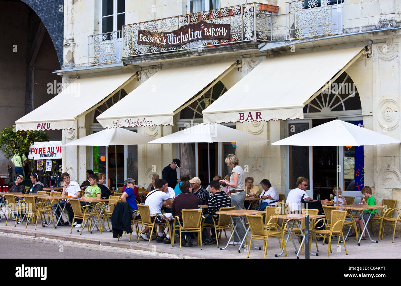 Diners at Le Richelieu Bar and Brasserie in Place du Marche in town of Richelieu, Loire Valley, Indre et Loire, France Stock Photo
