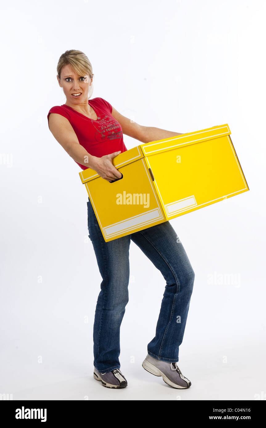 Woman lifting box Cut Out Stock Images & Pictures - Alamy