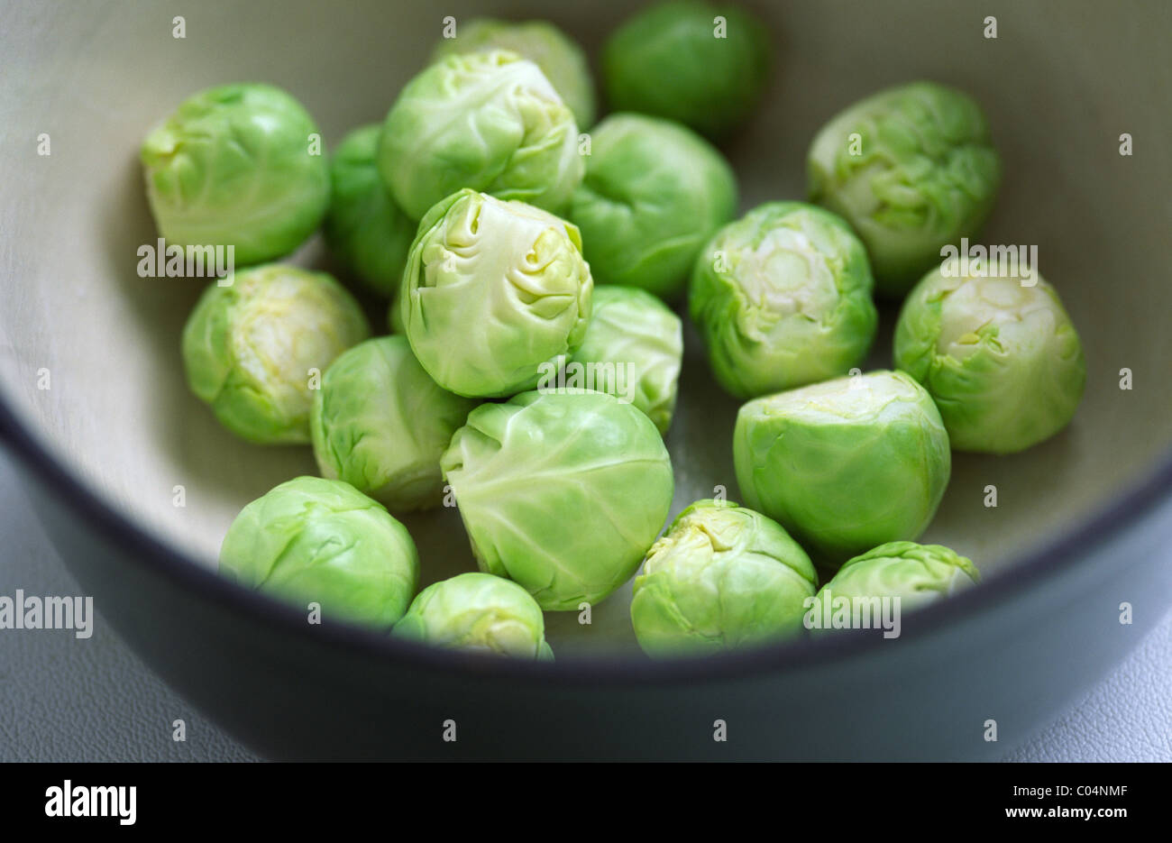Brussell Sprouts cut and prepared for cooking Stock Photo