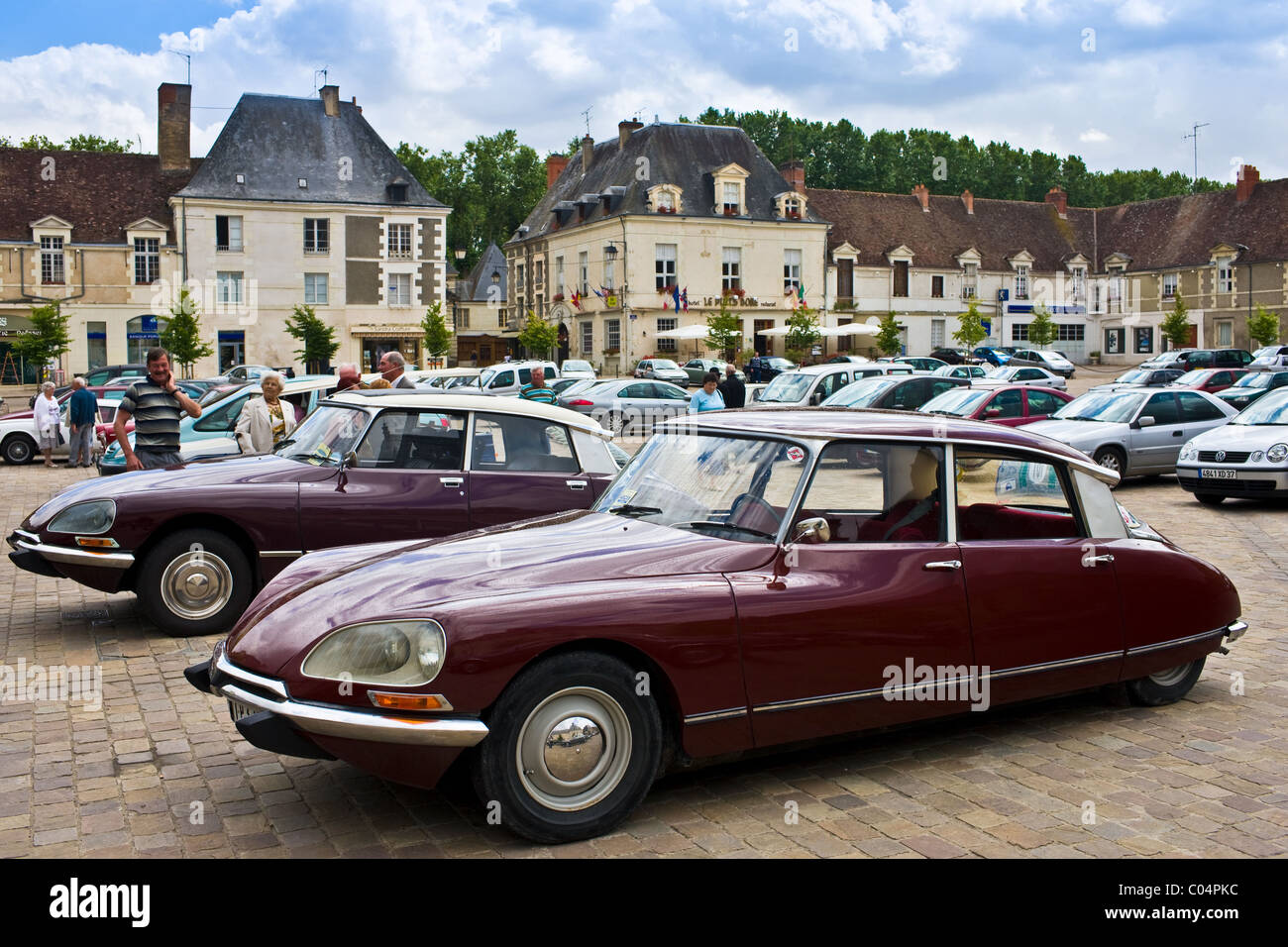 Traditional Citroen DS saloon cars in Place du Marche town square, Richelieu, France Stock Photo