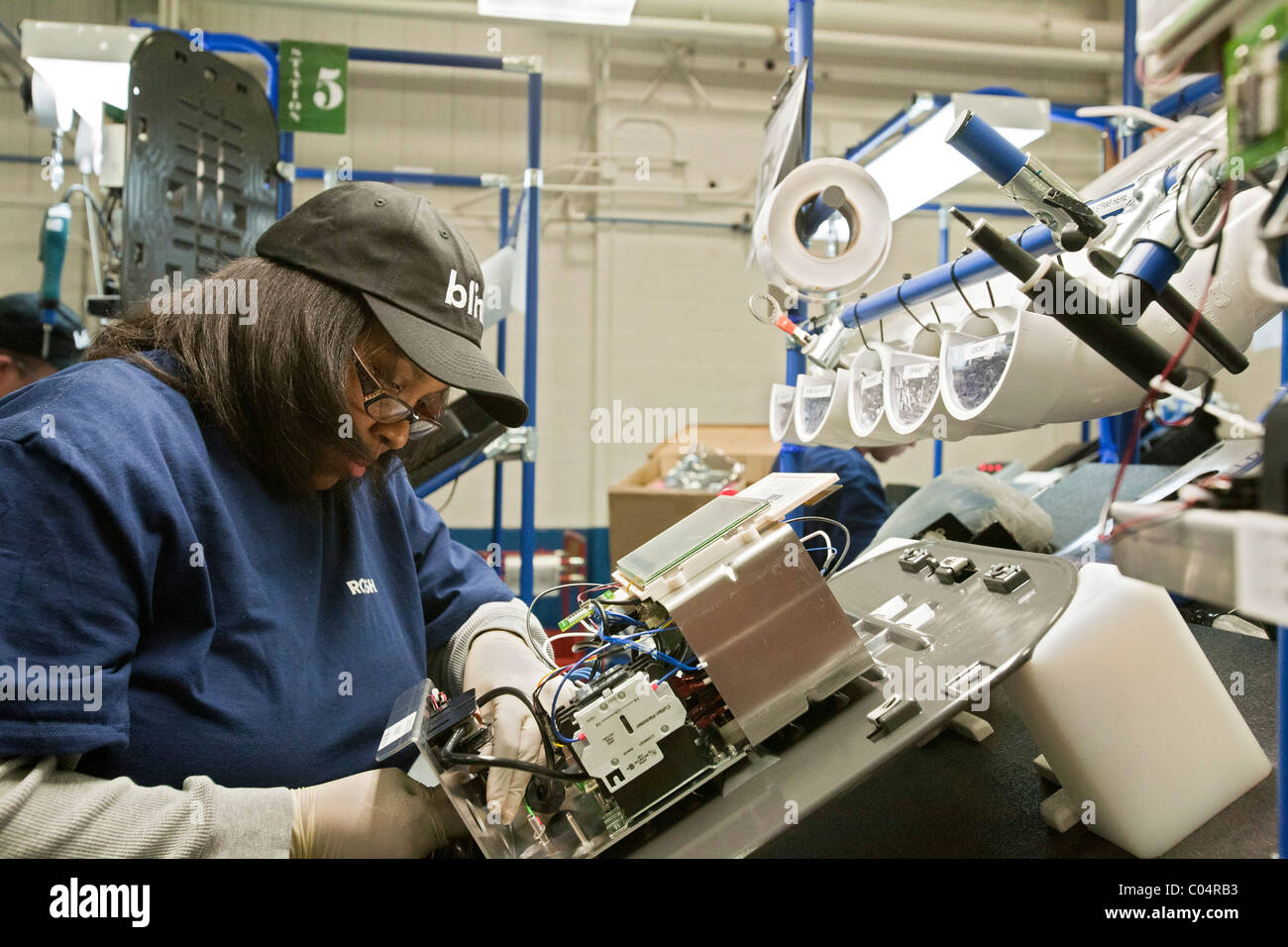 Workers Assemble Charging Stations for Electric Cars Stock Photo - Alamy