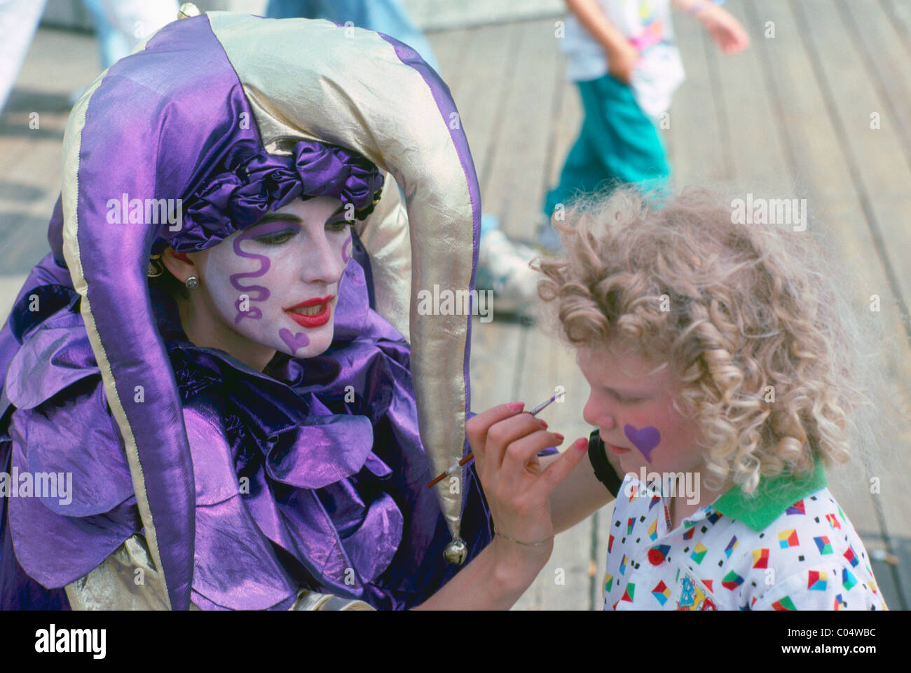 Child with clown face painting hi-res stock photography and images - Alamy
