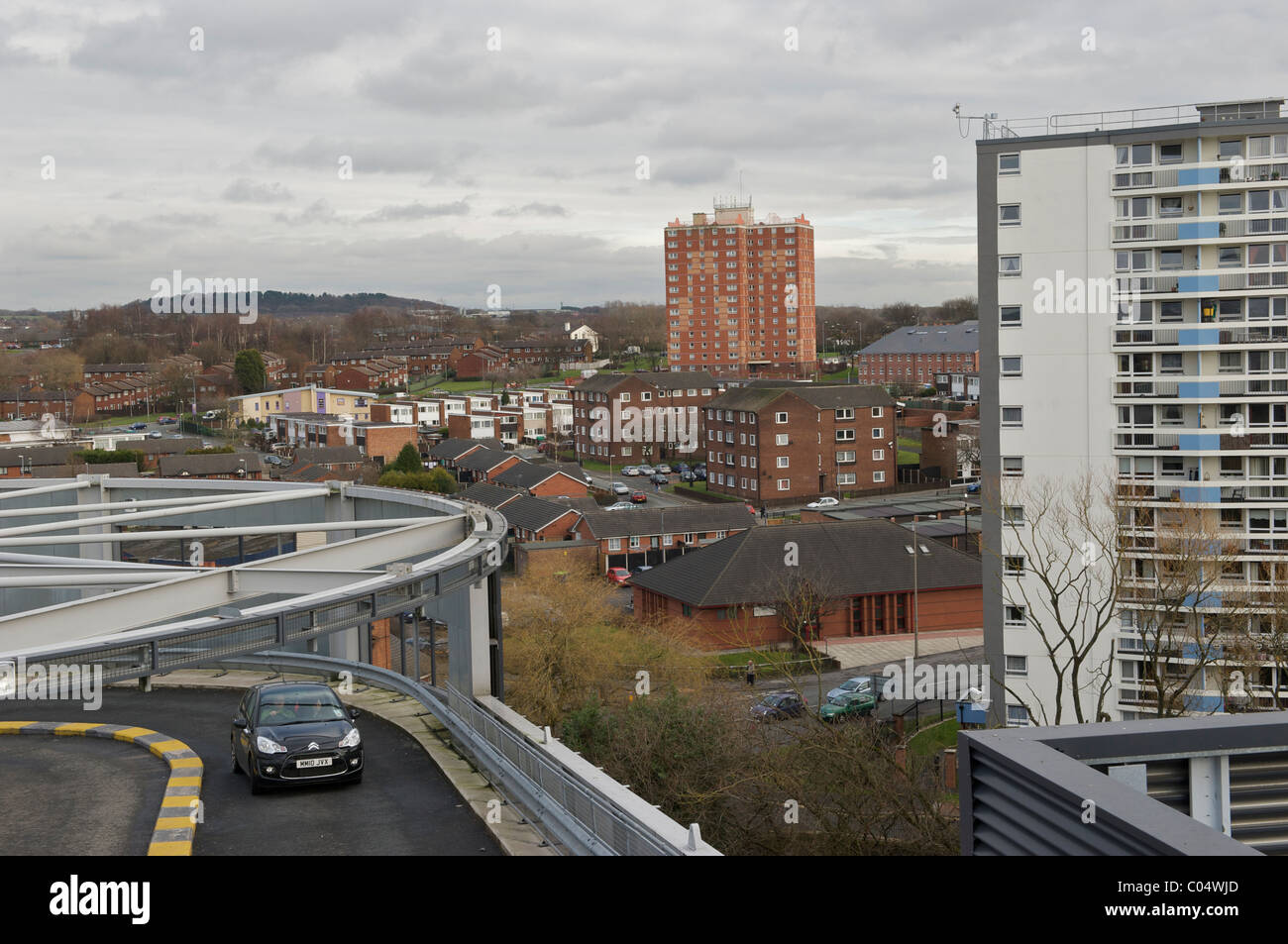Wigan town centre car park and housing Stock Photo