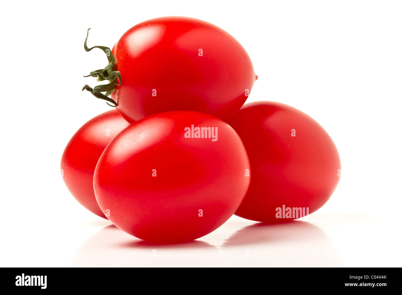 Close up of Vibrant Italian plum tomatoes from low perspective. Stock Photo