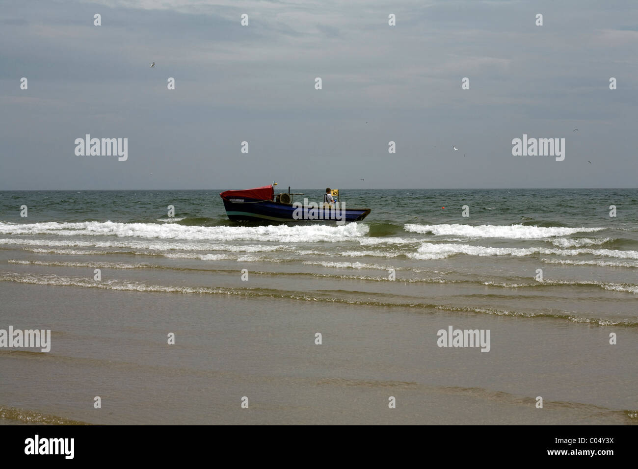 Fishing Coble, fishing close inshore Alnmouth Bay Alnmouth