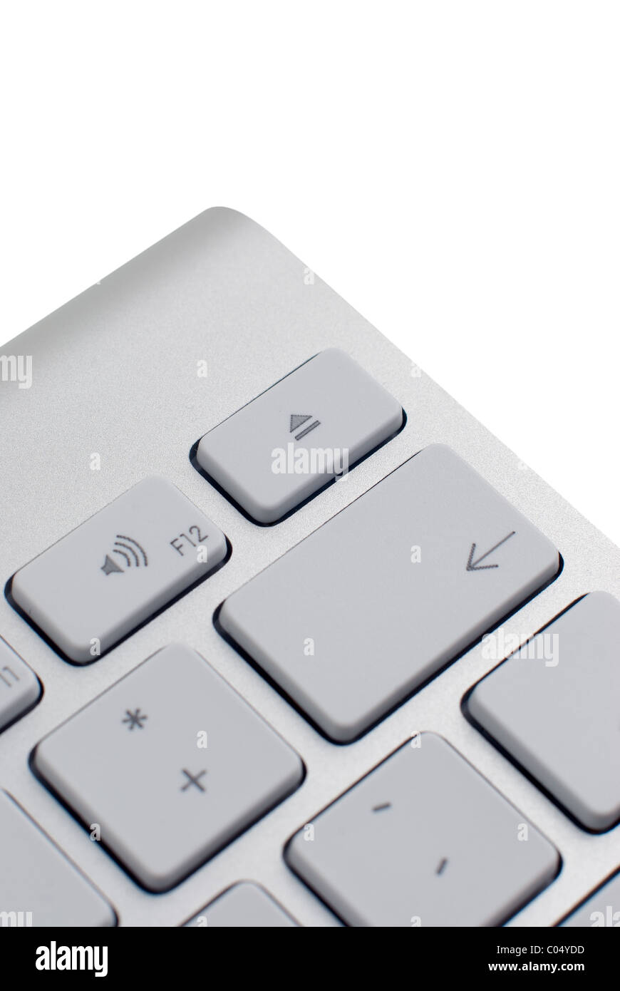 Closeup of a modern aluminium keyboard, focus on the eject key Stock