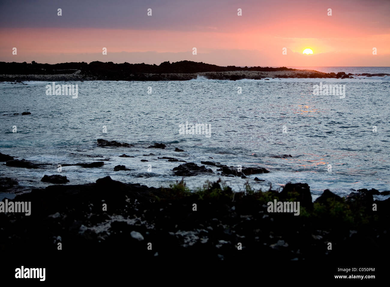 Kekaha Kai State Park at sunset in Hawaii Stock Photo