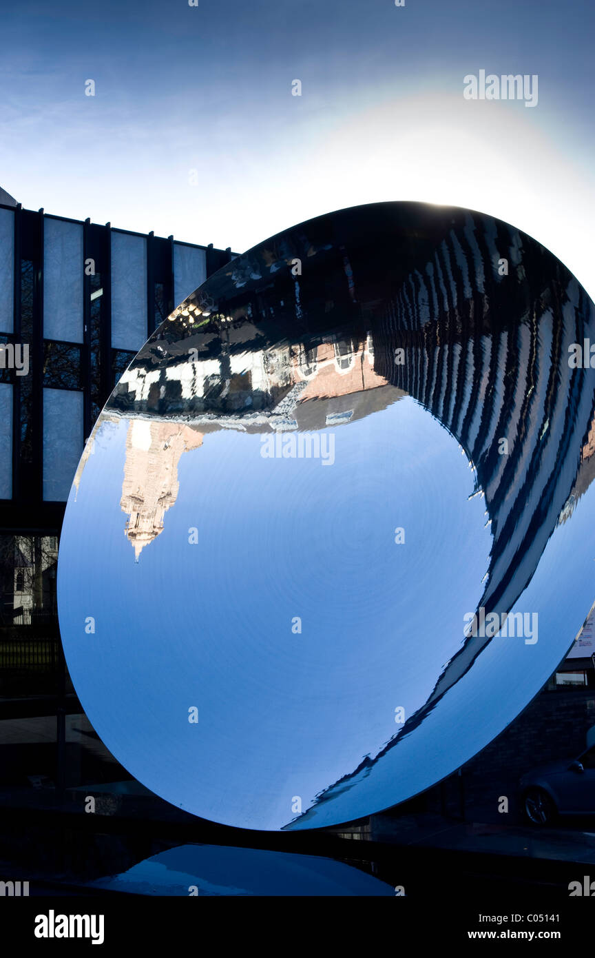 Anish Kapoor's Sky Mirror next to the Nottingham Playhouse on a sunny winter's day with a clear blue sky. Stock Photo