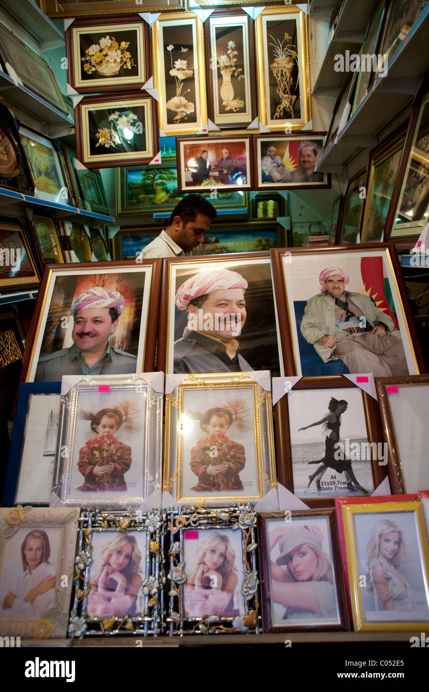 A vendor selling pictures and frames in the bazaar district in the old city of Erbil, in the Kurdistan autonomous region of Northern Iraq. Stock Photo