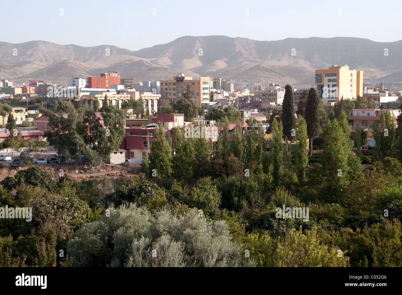 Houses and apartment buildings in a residential neighbourhood in the Kurdish city of Duhok (Dohuk) in the Kurdistan Autonomous Region, Northern Iraq. Stock Photo