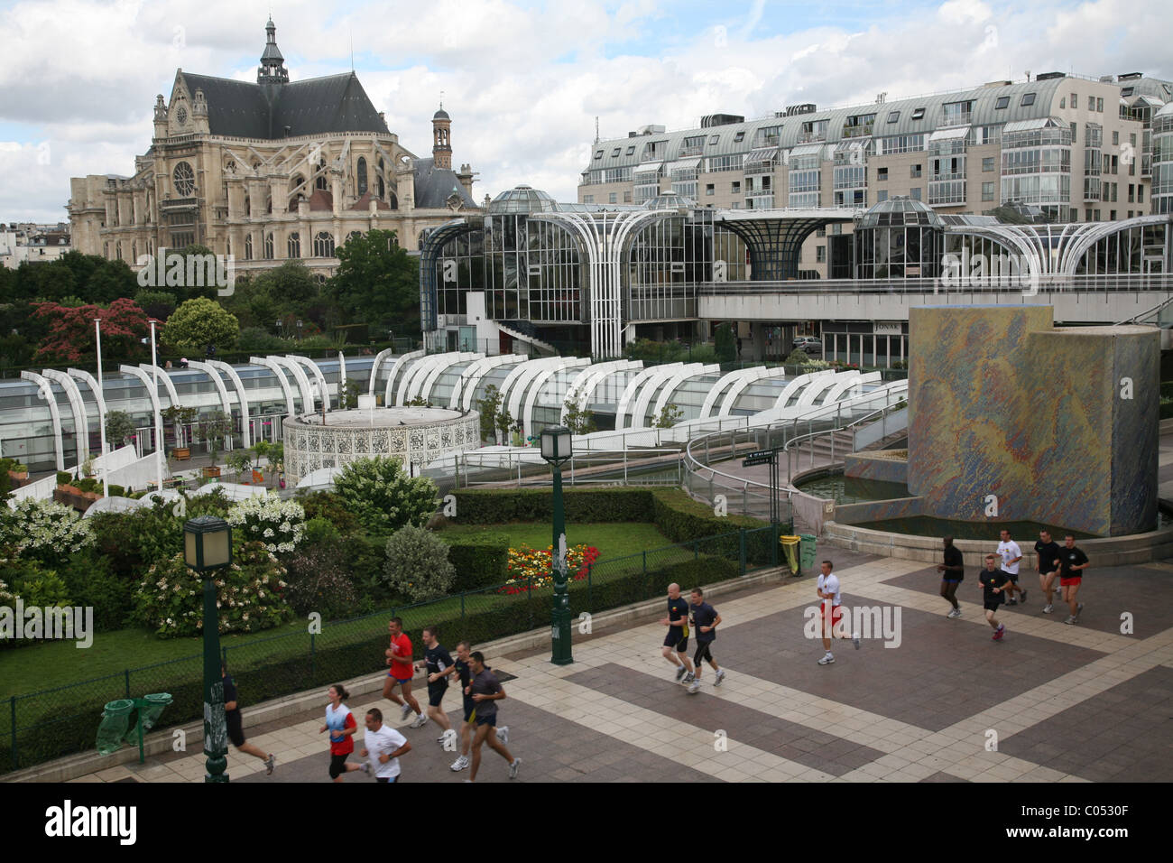 Joggers at Les Halles, Paris Stock Photo