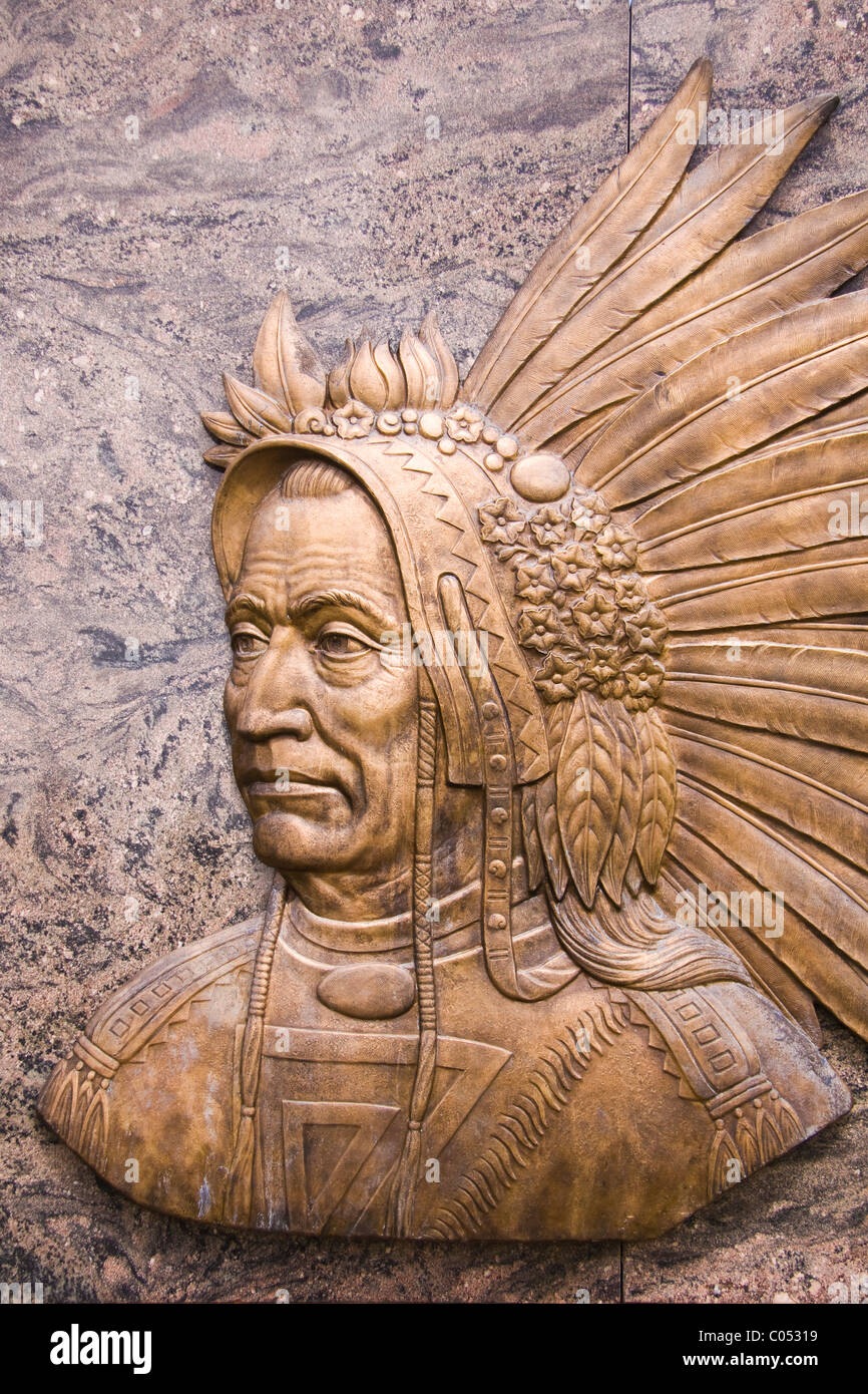 A bronze bust of Chief Powhatan on a marble memorial donated to The Pamunkey Reservation, Virginia. Stock Photo