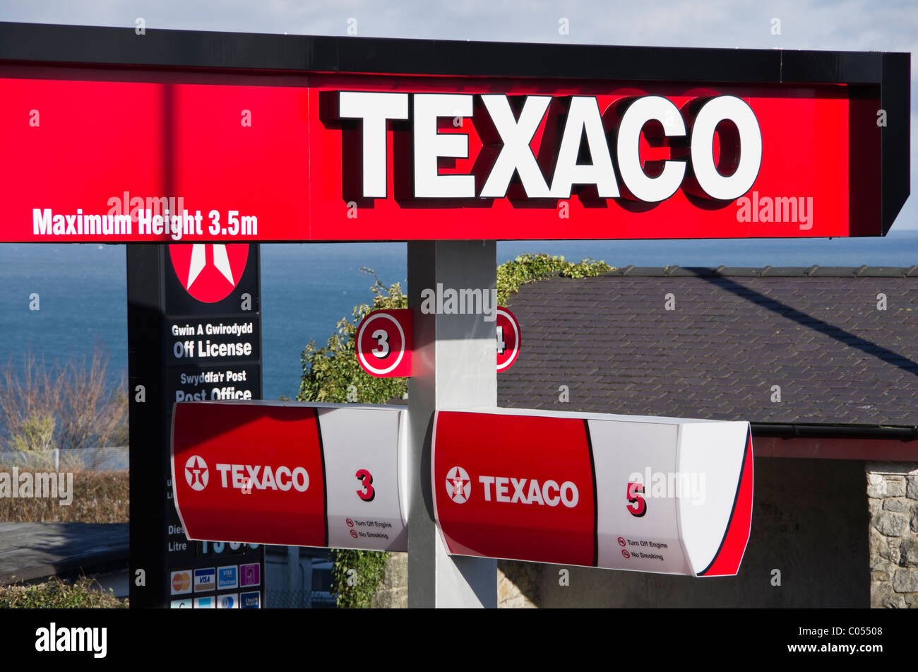 Texaco petrol station sign above the garage forecourt. Wales, UK, Britain Stock Photo