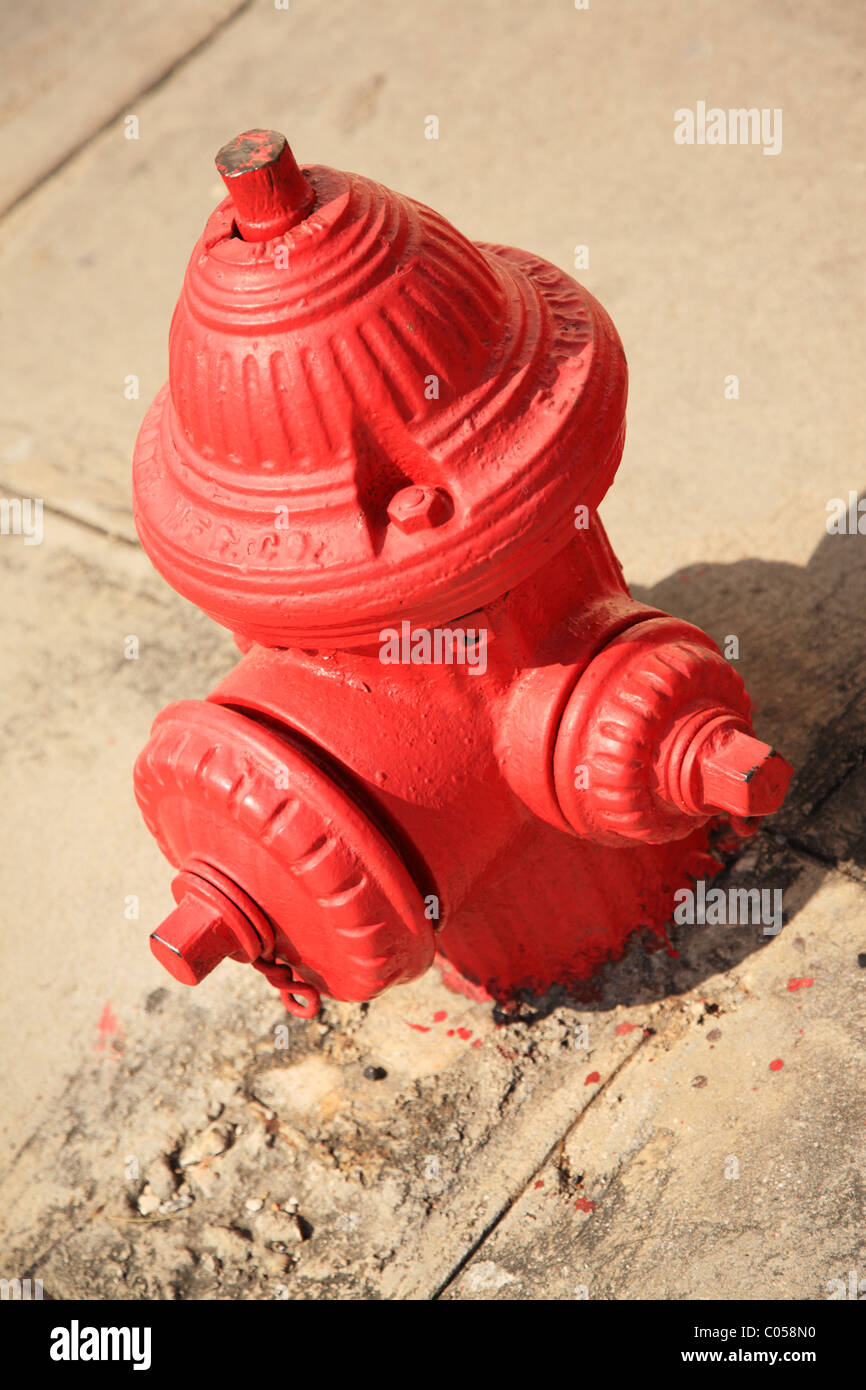 Red Fire Hydrant in the street in Cuba Stock Photo