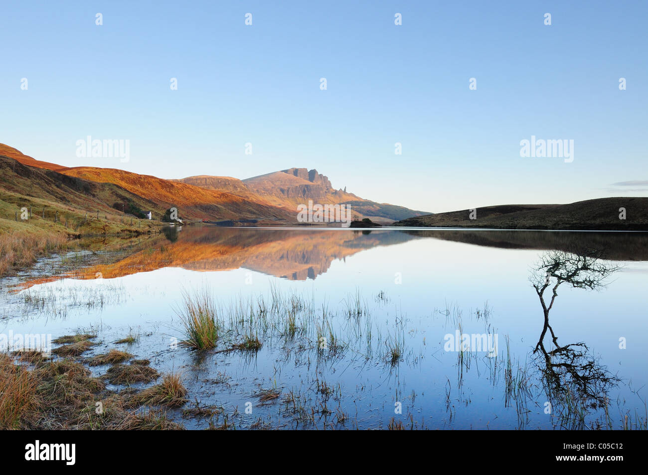 Storr and Old Man of Storr reflected in Loch Leathan, Isle of Skye, Inner Hebrides, Scottish Highlands, Scotland Stock Photo
